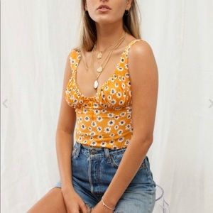 Isabella’s cabinet orange daisy top never worn
